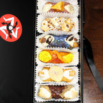 New Year's SetBox of 6 Gourmet Cannoli. This carefully curated box features six unique and innovative flavour combinations that take the classic Italian dessert to new heights. Each cannoli is filled with a luxurious, creamy filling made from the finest ingredients, offering a twist on tradition that will thrill your taste buds with every bite!&nbsp; Included in the SetBox are:&nbsp;


Top to bottom:&nbsp; The Lavender Honey, The Toronne, The Cookie Monster, The Mango, The Banoffee, and The S'Mores.