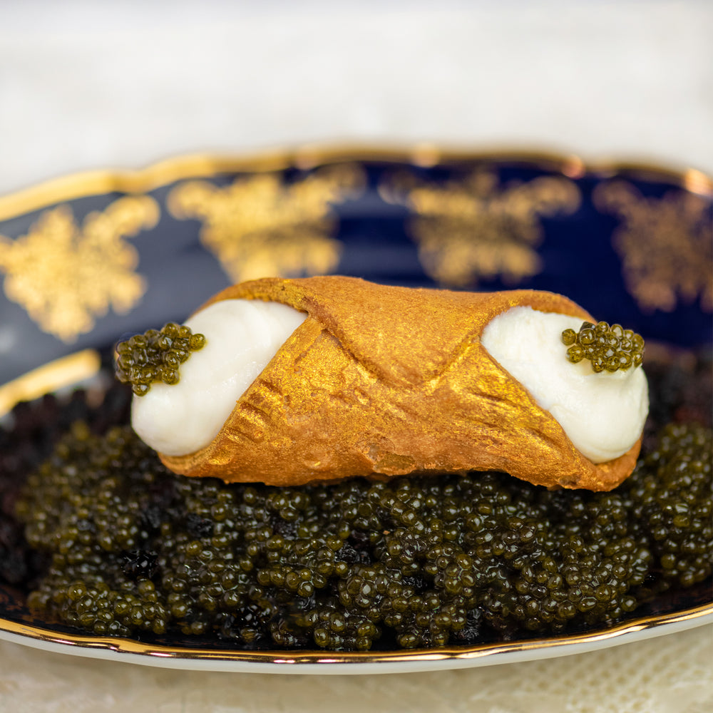 Decadent & delicious!  Celebrate the Holiday Season with Cannoli Crunch's creamy, smooth ricotta blended with herbs and trimmed with the finest Malossol Caviar and piped into our glistening gold crispy, crunchy pastry shell.  Serve for lunch, brunch, or as an appetizer at your special events.  This cannoli is the BOMB!